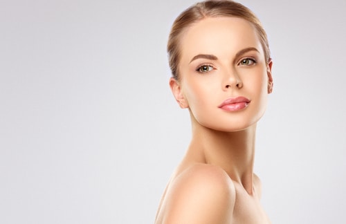 Model showcasing results of microneedling with PRP at Vitality Collective.