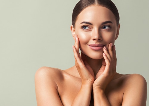 Woman with smooth skin, representing microneedling results at Vitality Collective.