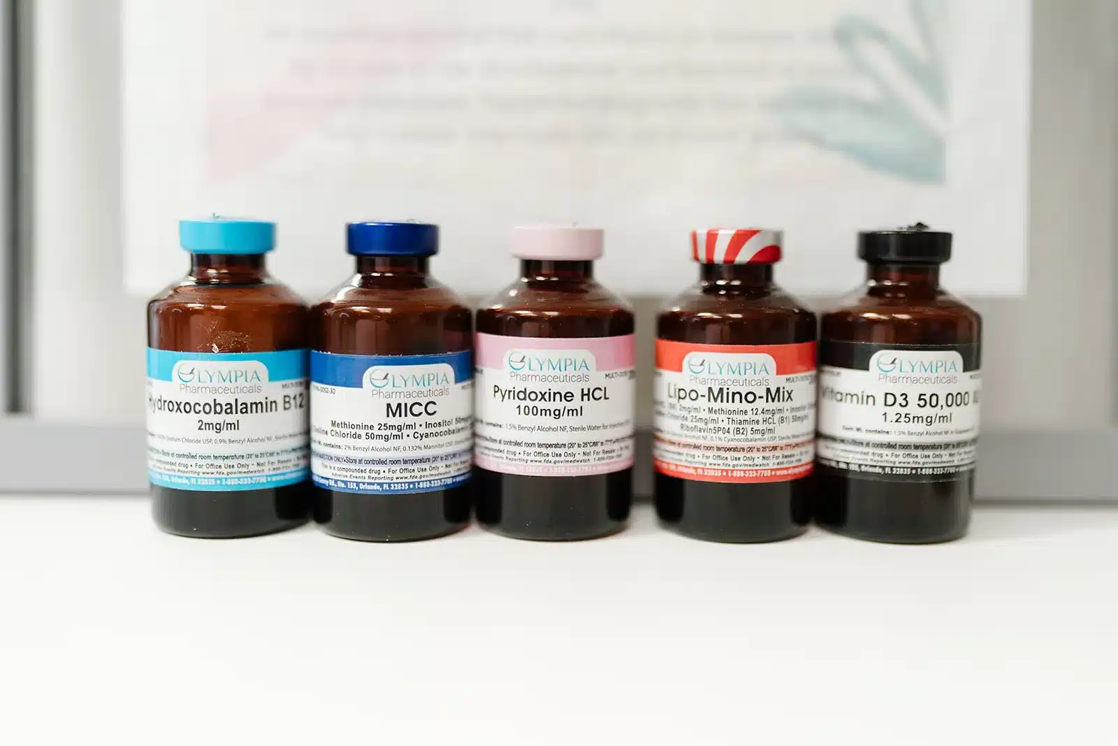 Vitality Collective Vitamin Shot vials including Hydroxocobalamin B12 and MICC.